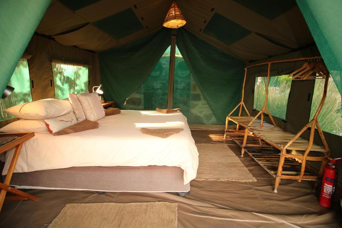 Вилла Epupa Camp Экстерьер фото