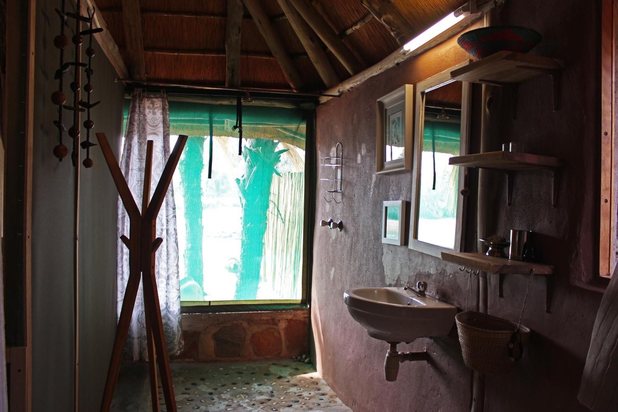 Вилла Epupa Camp Экстерьер фото