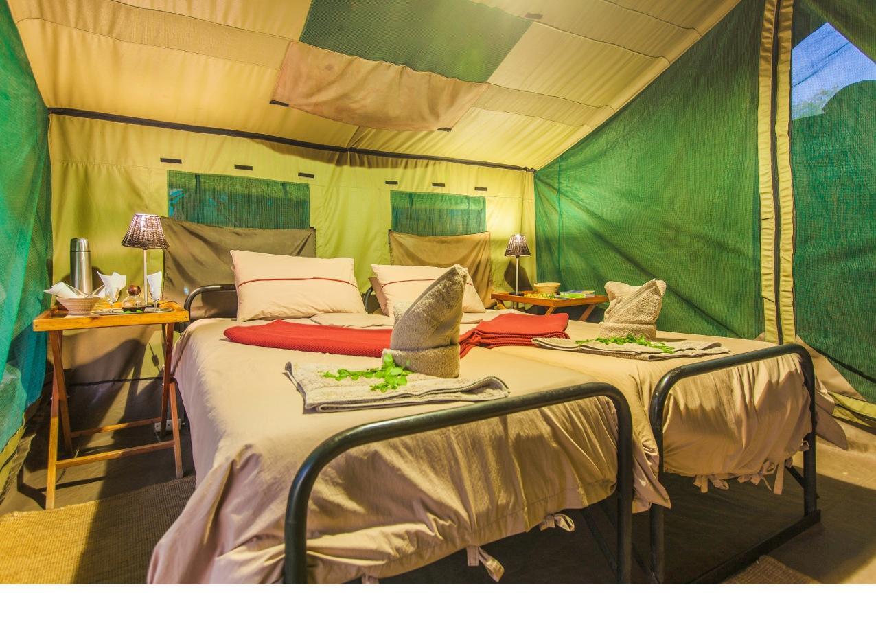 Вилла Epupa Camp Экстерьер фото