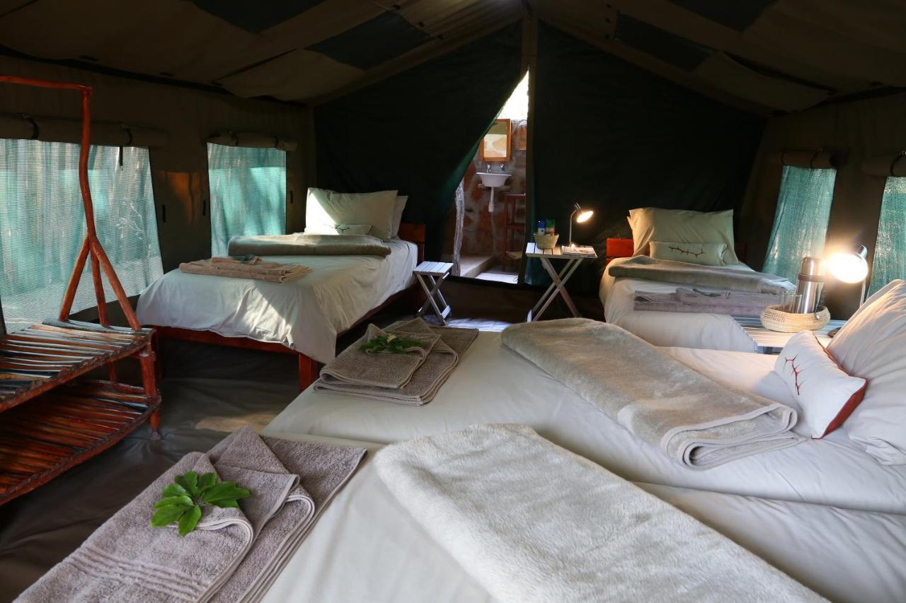 Вилла Epupa Camp Экстерьер фото