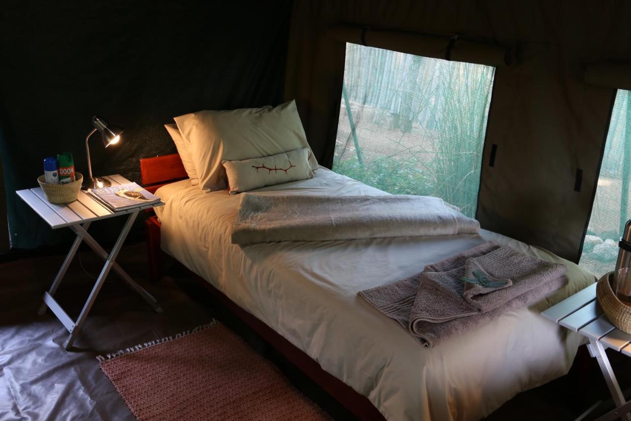 Вилла Epupa Camp Экстерьер фото